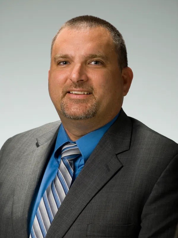 Headshot of commissioner Nathan Rust